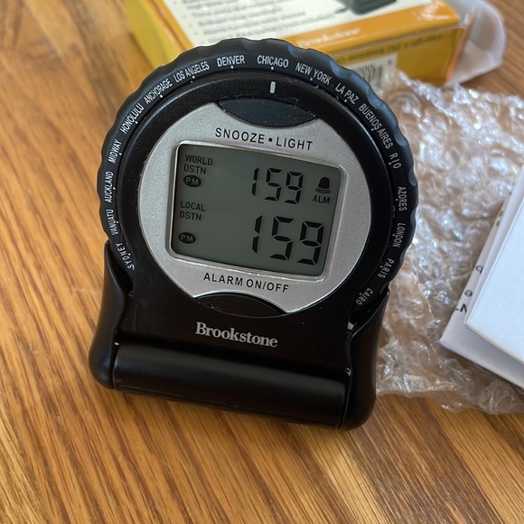 Brookstone Universal Voltage & Outlet Adapter & Dual Time Zone Clock - Picture 9 of 10